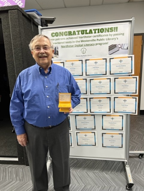 Fred is pictured here with a trophy created with our 3D printer to represent his accomplishment
